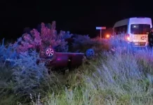 Choque frontal entre una camioneta de personal y un particular en la 120