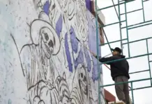 Alistan mural con elementos históricos y alusivos al Día de Muertos en San Juan del Río